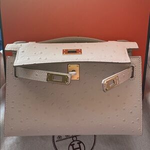 Hermes style small bag ostrich like real leather